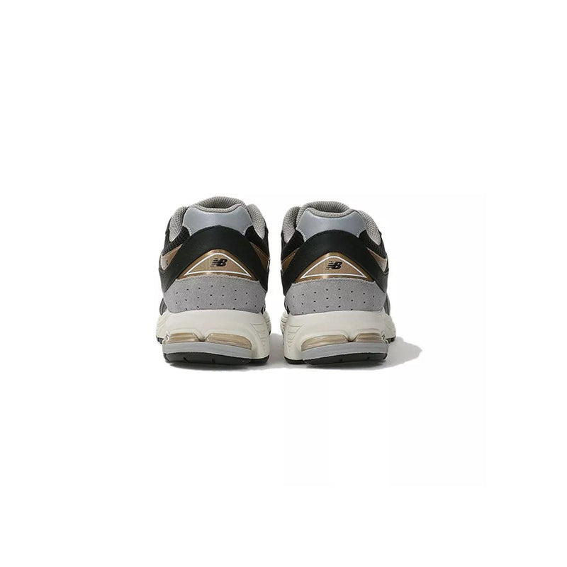 Baskets M2002 - Noir/Doree