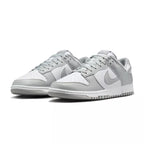 Zapatillas Nike Dunk Low Retro - Gris y Blanco