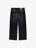 Le Pantalon Baggy En Denim Noir Délavé