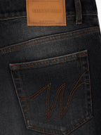 Le Pantalon Baggy En Denim Noir Délavé