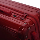 Cierre combinado TSA y cremallera de doble cursor GYL en la maleta rígida Intemporelle de color rojo oscuro. #color_rojo_oscuro