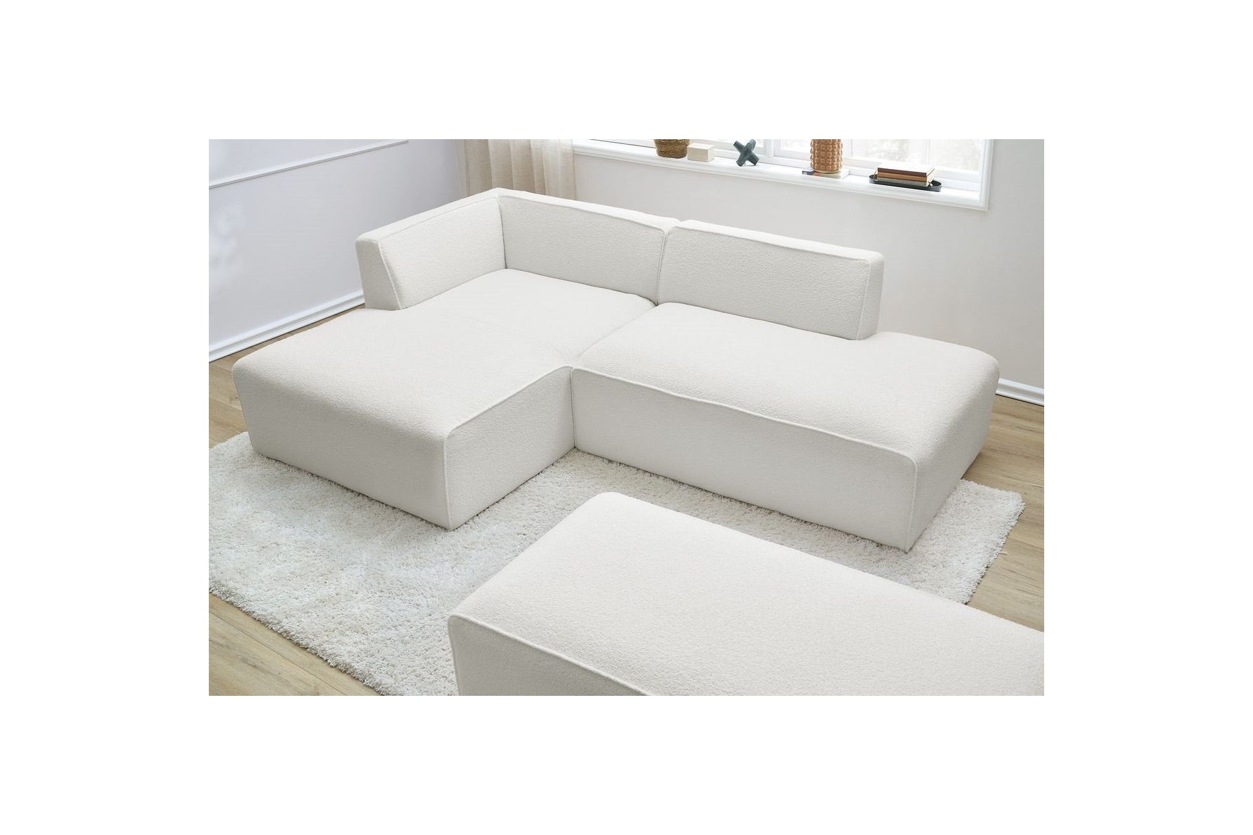 Megeve - Canapé D'Angle Fixe Modulable - Tissu Bouclette - Avec Pouf - Angle Gauche