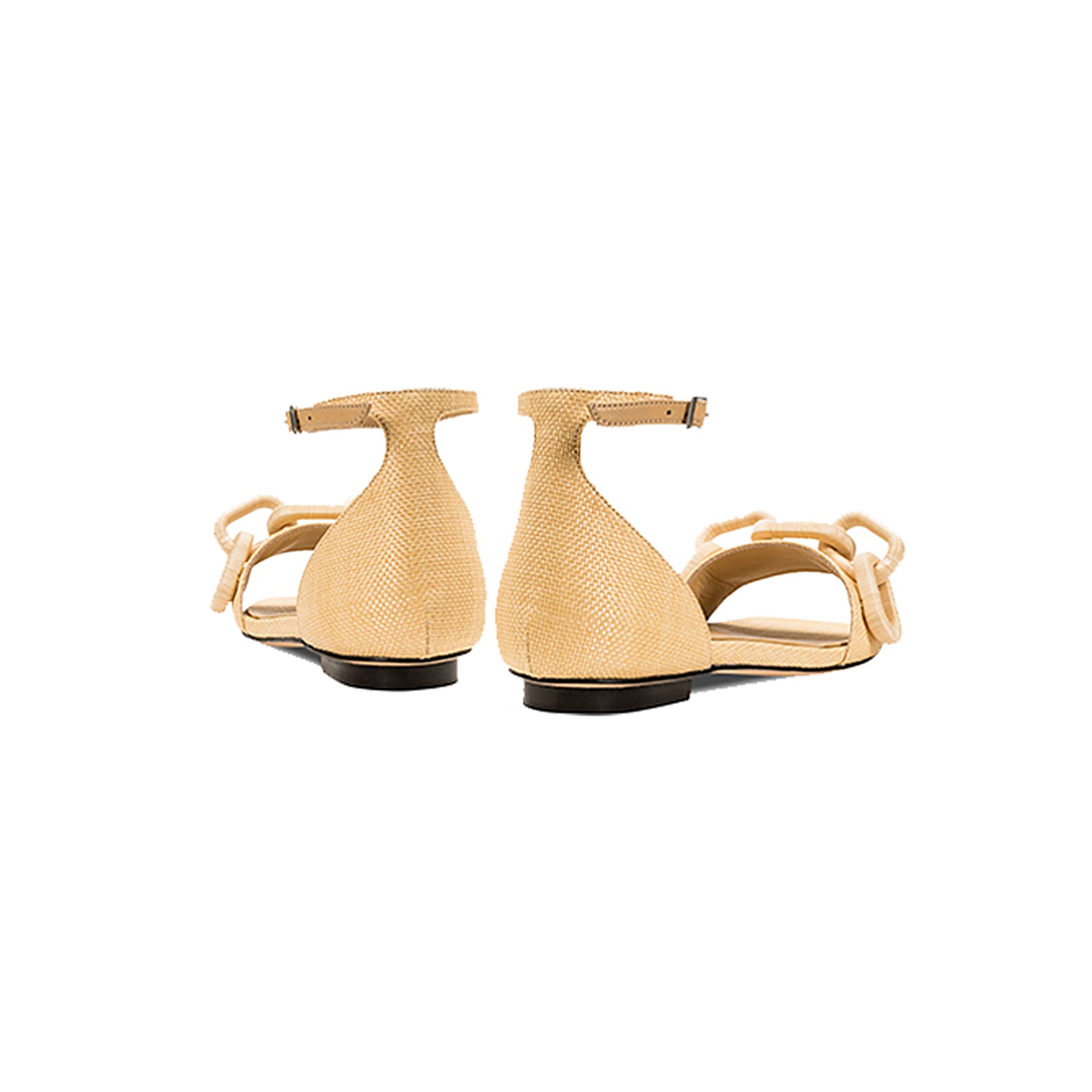 Back view of Catena Natural Flat Ankle Sandal showcasing the elegant design and natural raffia chain detail.