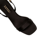 Catena Notte Black Platform Slingback Sandal featuring silk satin design and metallic chain details.