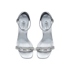 Catena Notte Silver & Glam High-Heel Ankle Sandal features shimmering silver leather and jeweled Catena chain link.