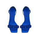 Top view of Catena Sapphire High-Heel Ankle Sandal in lustrous blue satin with sculptural chain link embellishments.