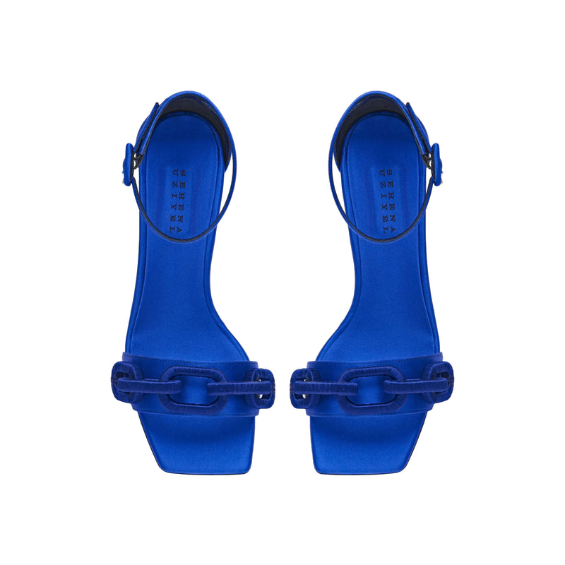 Top view of Catena Sapphire High-Heel Ankle Sandal in lustrous blue satin with sculptural chain link embellishments.