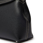 Toteme T-Lock Clutch Tas