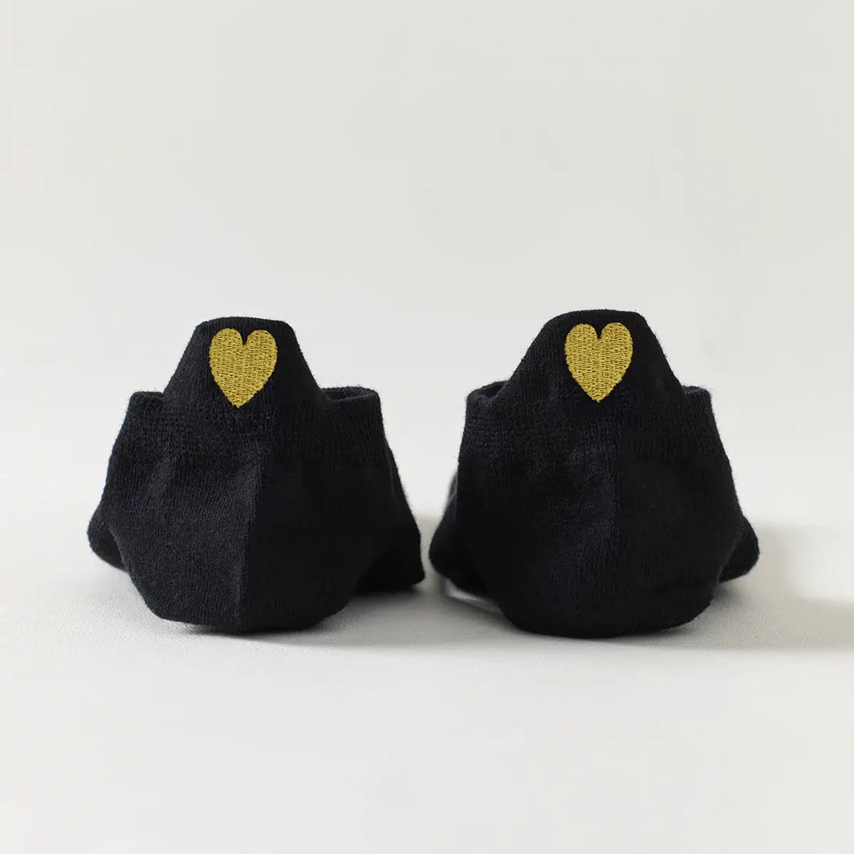 Chaussettes noir en coton à languette cœur doré pour femme 