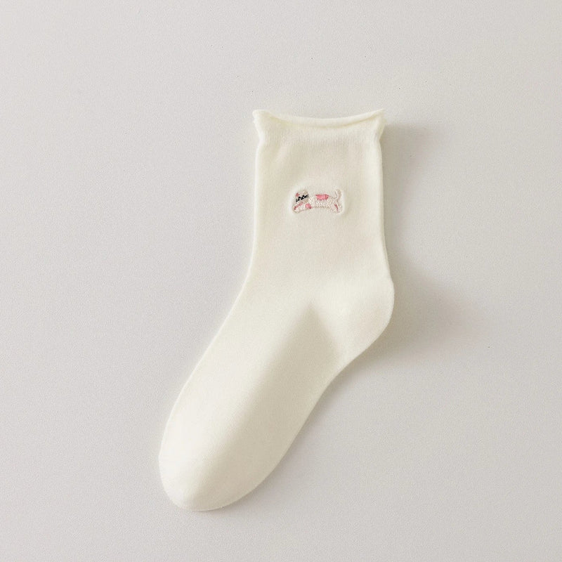 Chaussette femme crème vendue à l’unité avec broderie chien ou chat. Maille douce, bord roulotté et taille unique 35-41. Confort et fantaisie garantis.