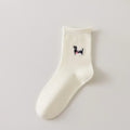 Chaussette femme crème vendue à l’unité avec broderie chien ou chat. Maille douce, bord roulotté et taille unique 35-41. Confort et fantaisie garantis.