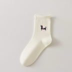 Chaussette femme crème vendue à l’unité avec broderie chien ou chat. Maille douce, bord roulotté et taille unique 35-41. Confort et fantaisie garantis.