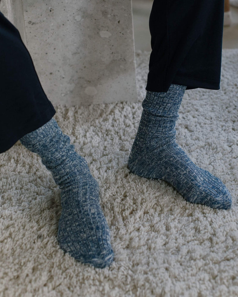 chaussette homme chinée beige clair Angarde porté tapis