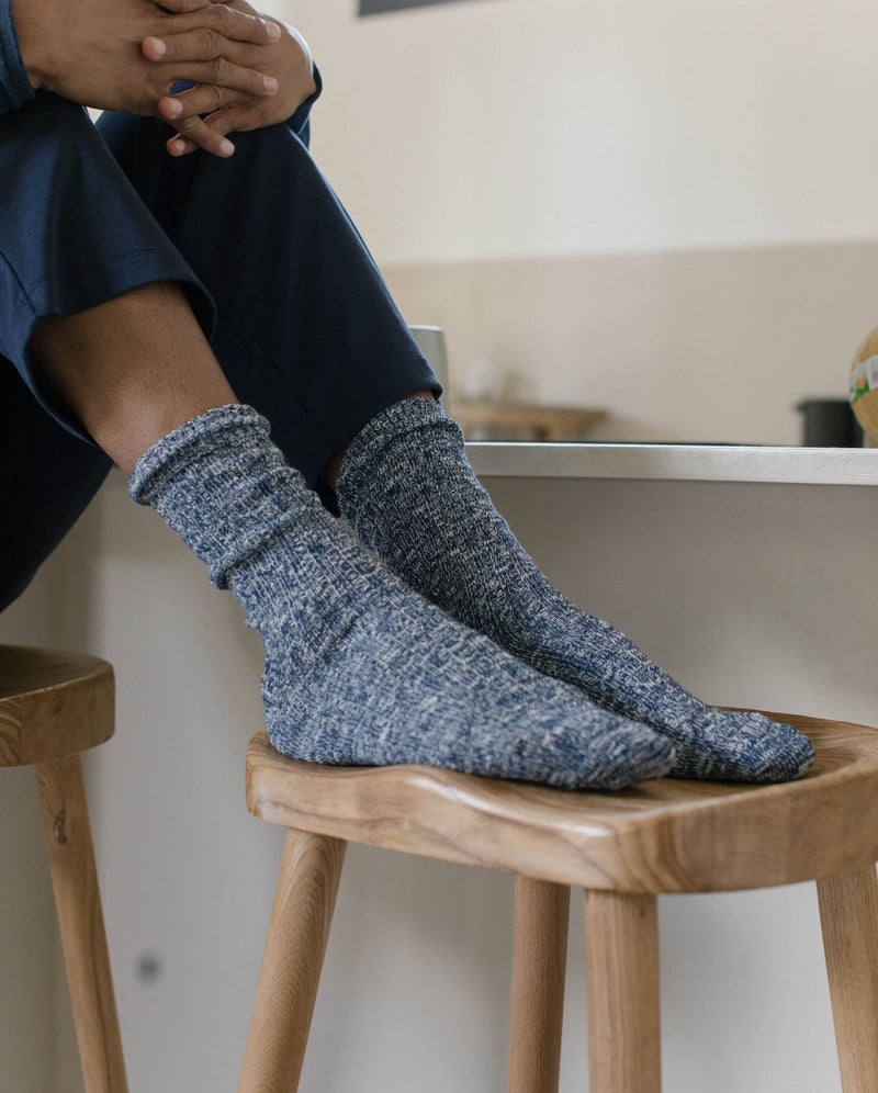 Angarde navy blue mottled men's sock worn close up