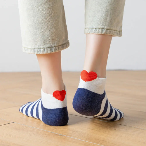 Socquette blanche avec languette cœur et motif marin.