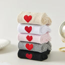 Lot chaussettes longues adultes en coton avec un cœur rose sur le côté 