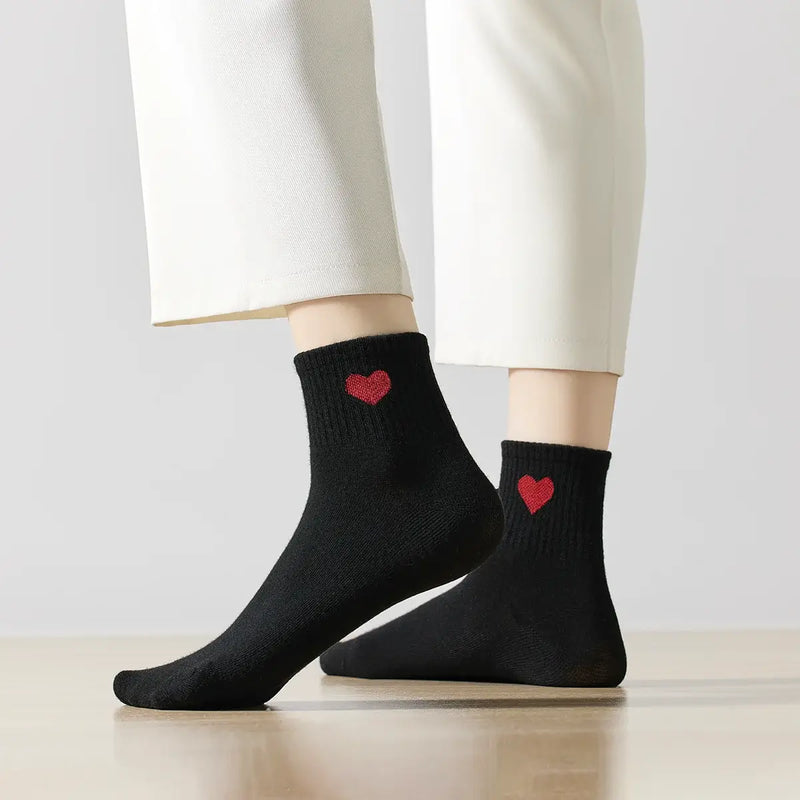 Chaussettes longues noir adultes en coton avec un cœur sur le côté