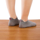 chaussette languettes coeur rose avec un oeil vue de côté