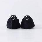 Chaussettes noir en coton à languette sourire à motif smiley pour femme 