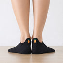 Chaussettes languette noires, motifs carottes brodés sur la languette 