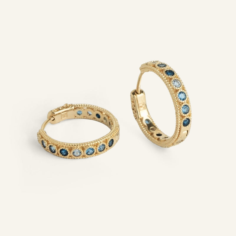 Boucles d'oreilles créoles femme plaqué or serties de pierres de zircons bleus