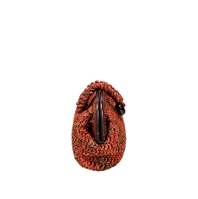 Delphine Ruggine pouch bag made from ruggine color raffia, showcasing rustic charm and natural elegance.