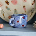 Taza Doli