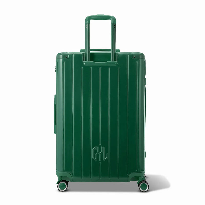 Vue arrière de la valise rigide GYL Intemporelle sapin avec poignées intégrées et roulettes pivotantes. #couleur_sapin