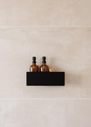 Duschablage SHEA con dos botellas en un estilo negro Regal in der Dusche