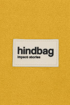 DETTAGLIO dell'etichetta Hindbag in silicone color zafferano