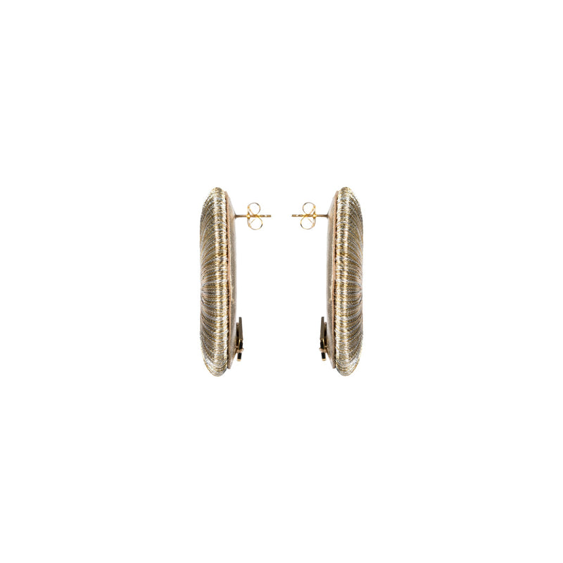 Close-up view of Boho Gold Silver Earring showcasing intricate hand-wrapped metallic threads in circular design.