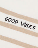 "good vibes" long-sleeved malo onesie#color_ivory-light-khaki