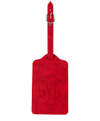 Red GYL luggage tag front view with Createur de Bagages logo transparent background