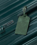 GYL fir luggage tag attached to suitcase Intemporelle fir