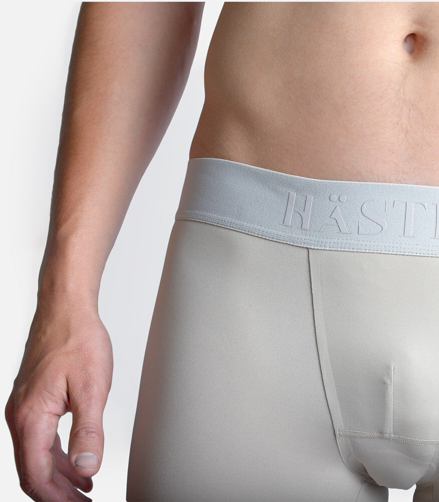 man wearing sports boxers #color_sand