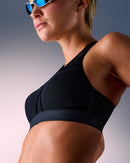 woman wearing a hastko BRA N°38 sports bra #color_true-black