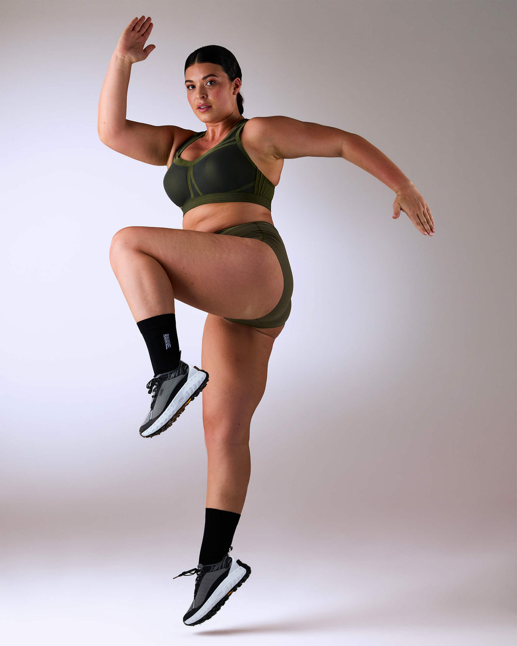 woman wearing a hastko BRA N°38 sports bra #color_kaki