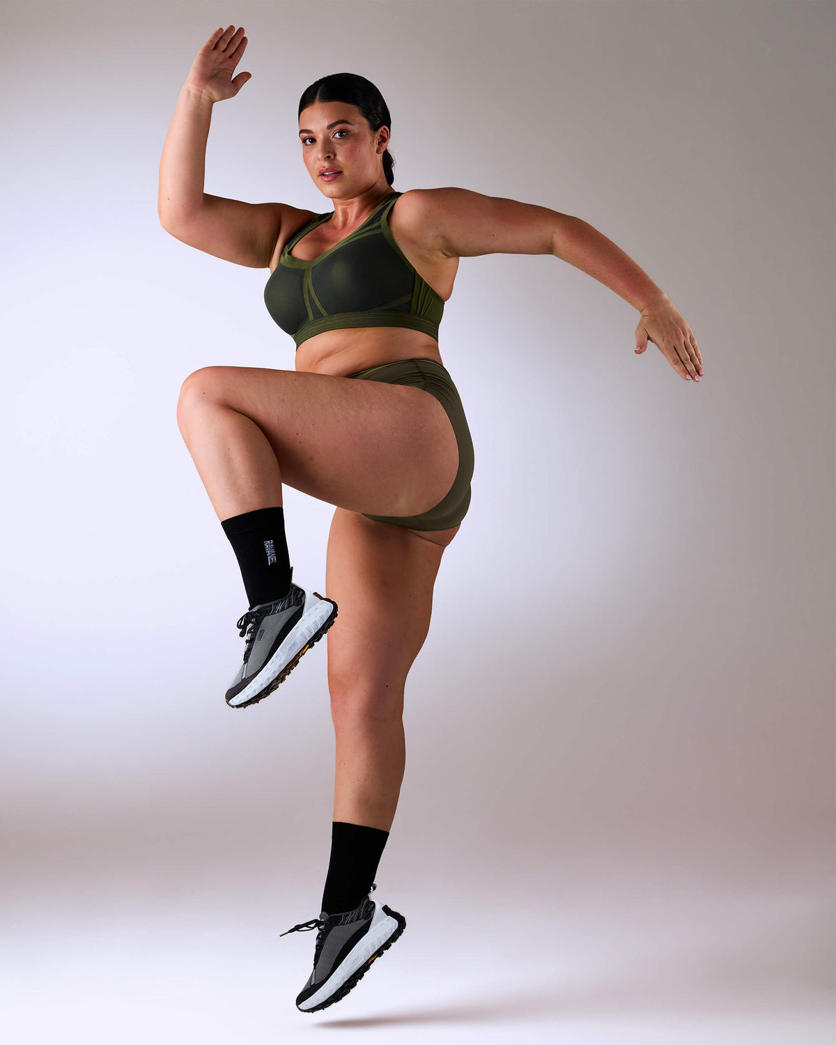 woman wearing a hastko BRA N°38 sports bra #color_kaki