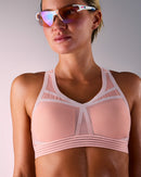woman wearing a hastko BRA N°38 sports bra #color_nude