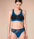woman wearing a sports bra #color_tropico-blue