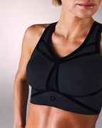 woman wearing a hastko BRA N°39 sports bra #color_true-black