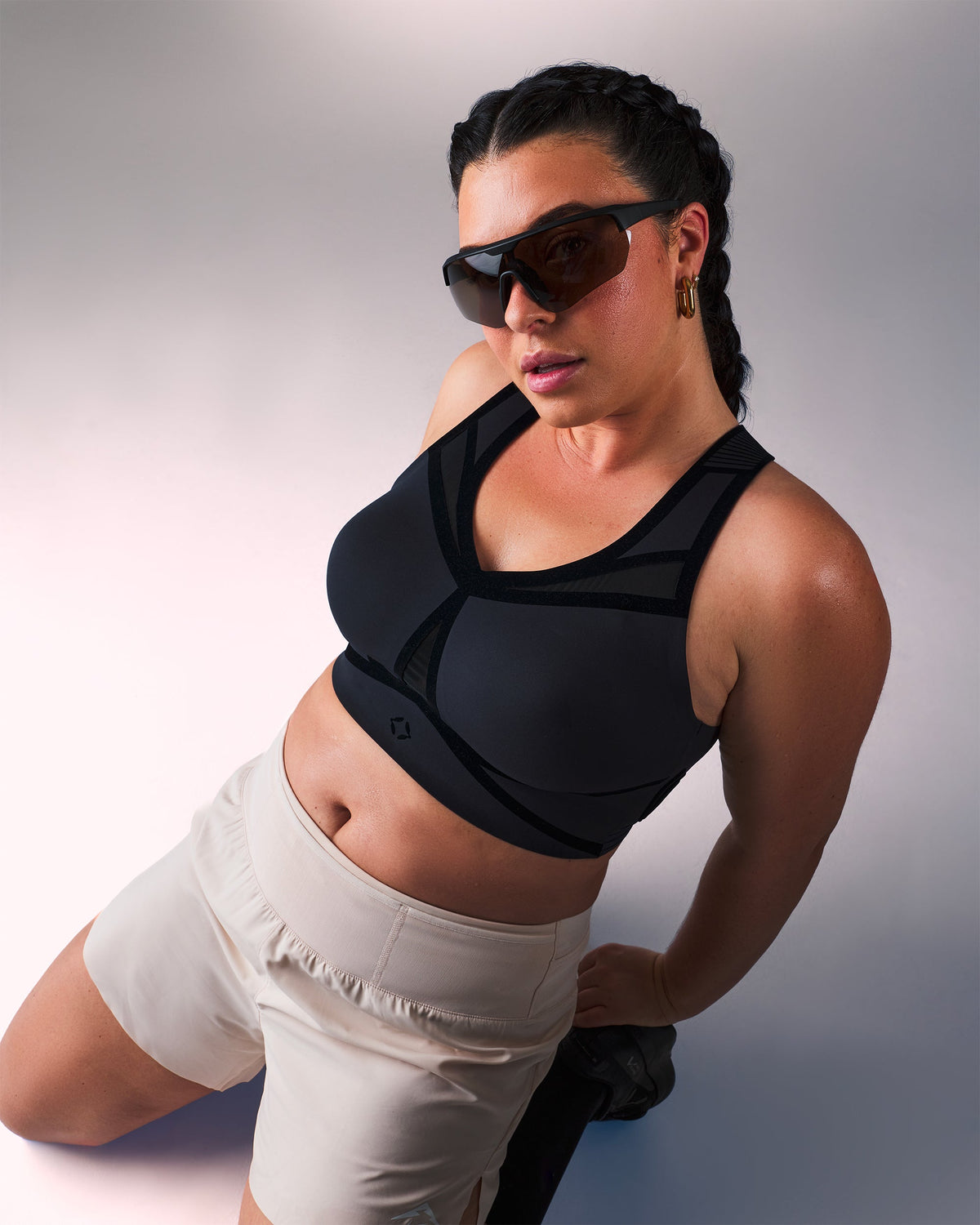 woman wearing a hastko BRA N°39 sports bra #color_true-black