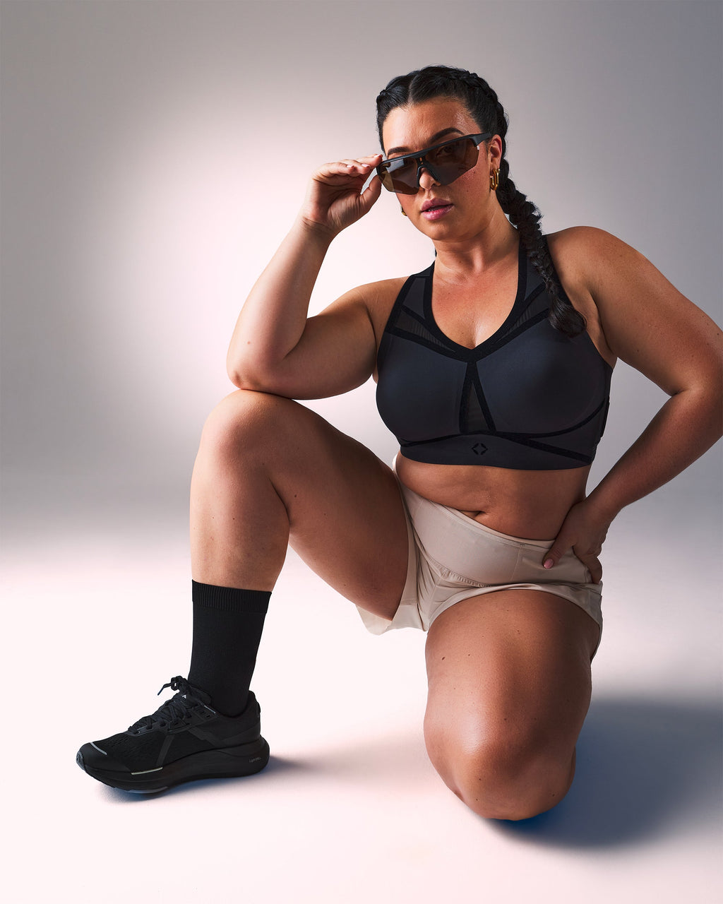 woman wearing a hastko BRA N°39 sports bra #color_true-black