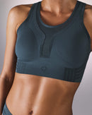 woman wearing a hastko BRA N°42 sports bra #color_ardoise