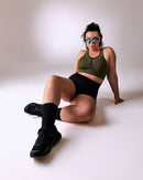 woman wearing a hastko BRA N°42 sports bra #color_kaki