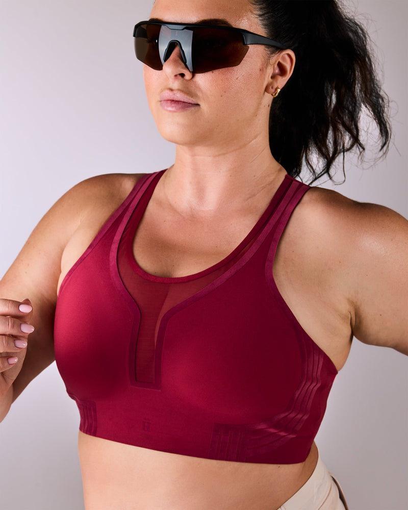 woman wearing a hastko BRA N°42 sports bra #color_tuscany-bordeaux