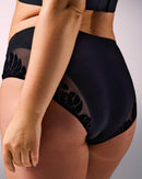 woman wearing seamless sports panties hastko PANTY N°91 #color_true-black
