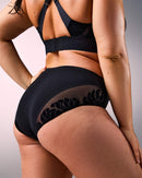 woman wearing seamless sports panties hastko PANTY N°91 #color_true-black