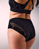 woman wearing seamless sports panties hastko PANTY N°91 #color_true-black