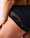 woman wearing seamless sports panties hastko PANTY N°91 #color_true-black
